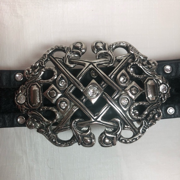 black leather belt with silver buckle
